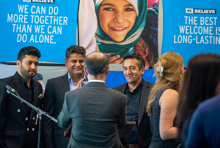 Employees getting their photos taken at the Northern Virginia Welcome Center awards ceremony.